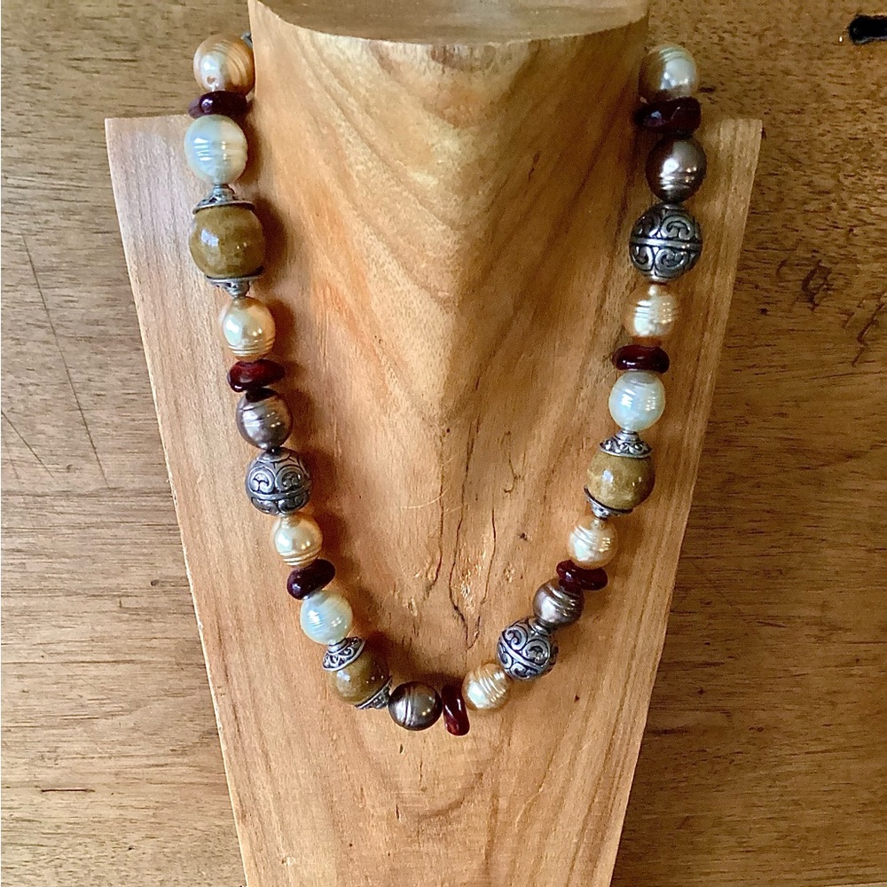 Stunning large faux pearl necklace with garnet chips.
